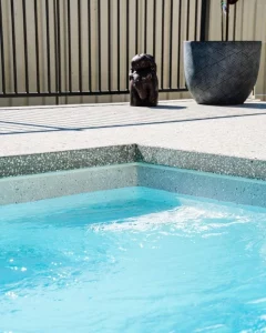 Concrete surrounds for swimming pool